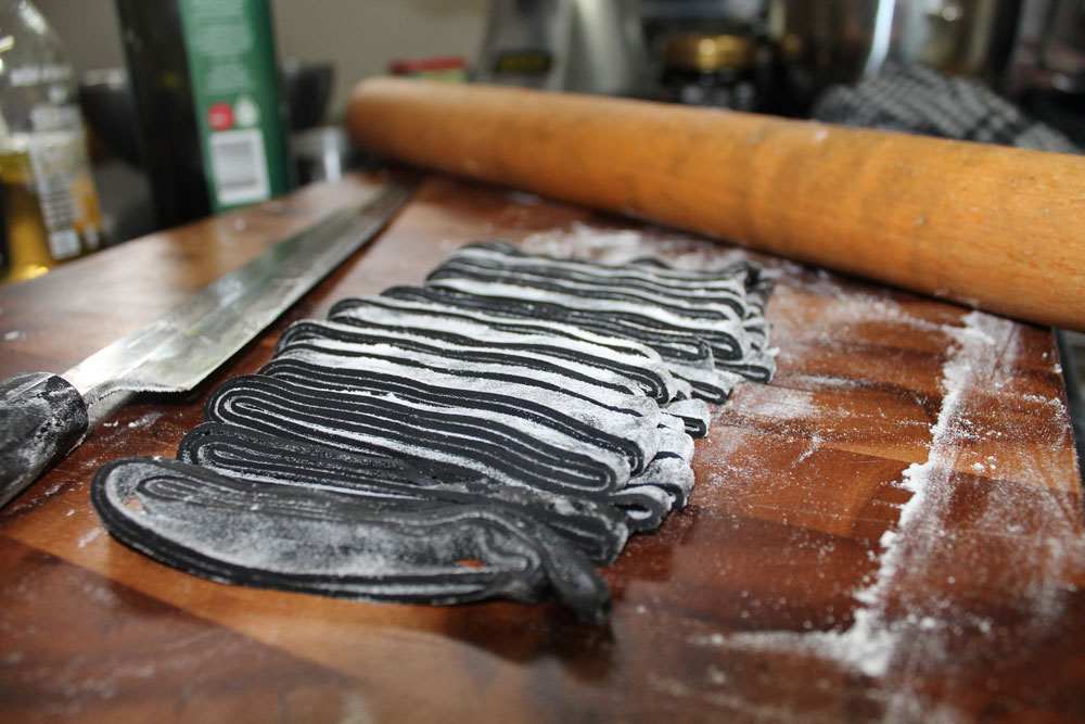 Slicing the squid ink pata