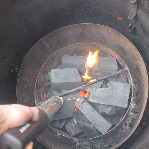 Using a heat gun to light the charcoal